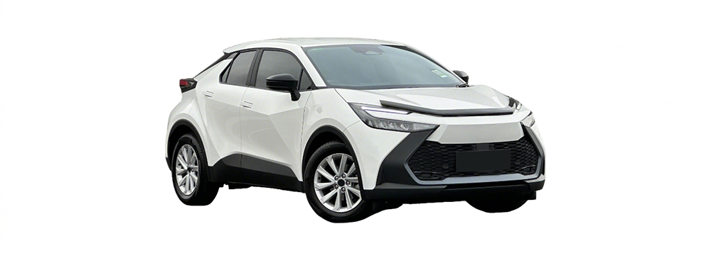 A side view of a red Toyota C-HR parked in an outdoor carpark.