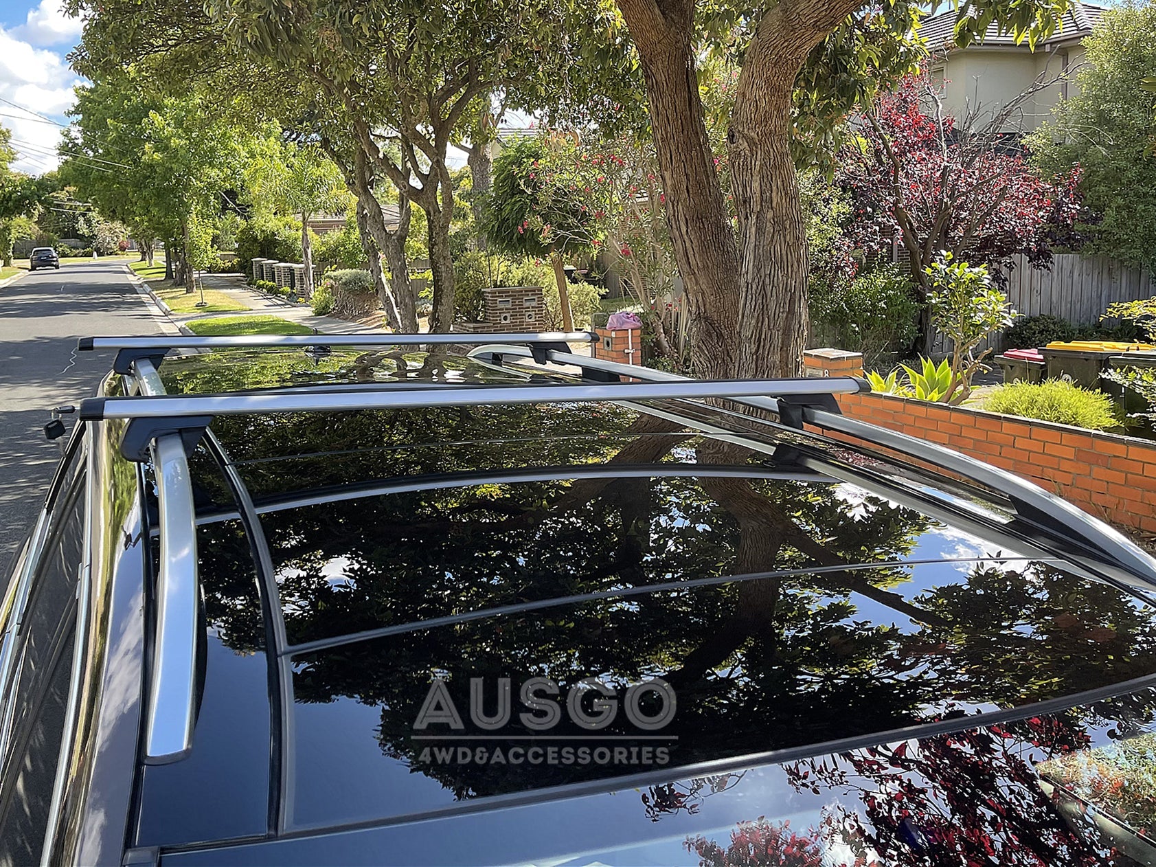 Top view of a Ford Kuga with cross bars installed on the car.