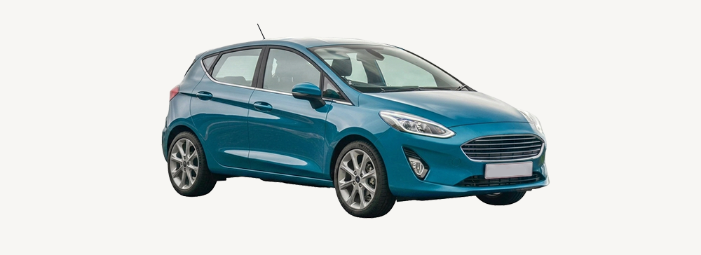 Side view of a black Ford Fiesta with weather shields installed on the windows. 