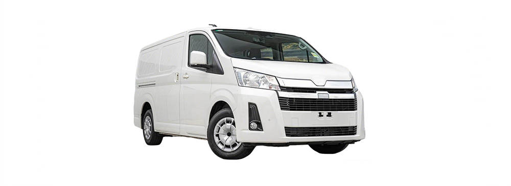 Side view of a white Toyota HiAce parked in an outdoor carpark.