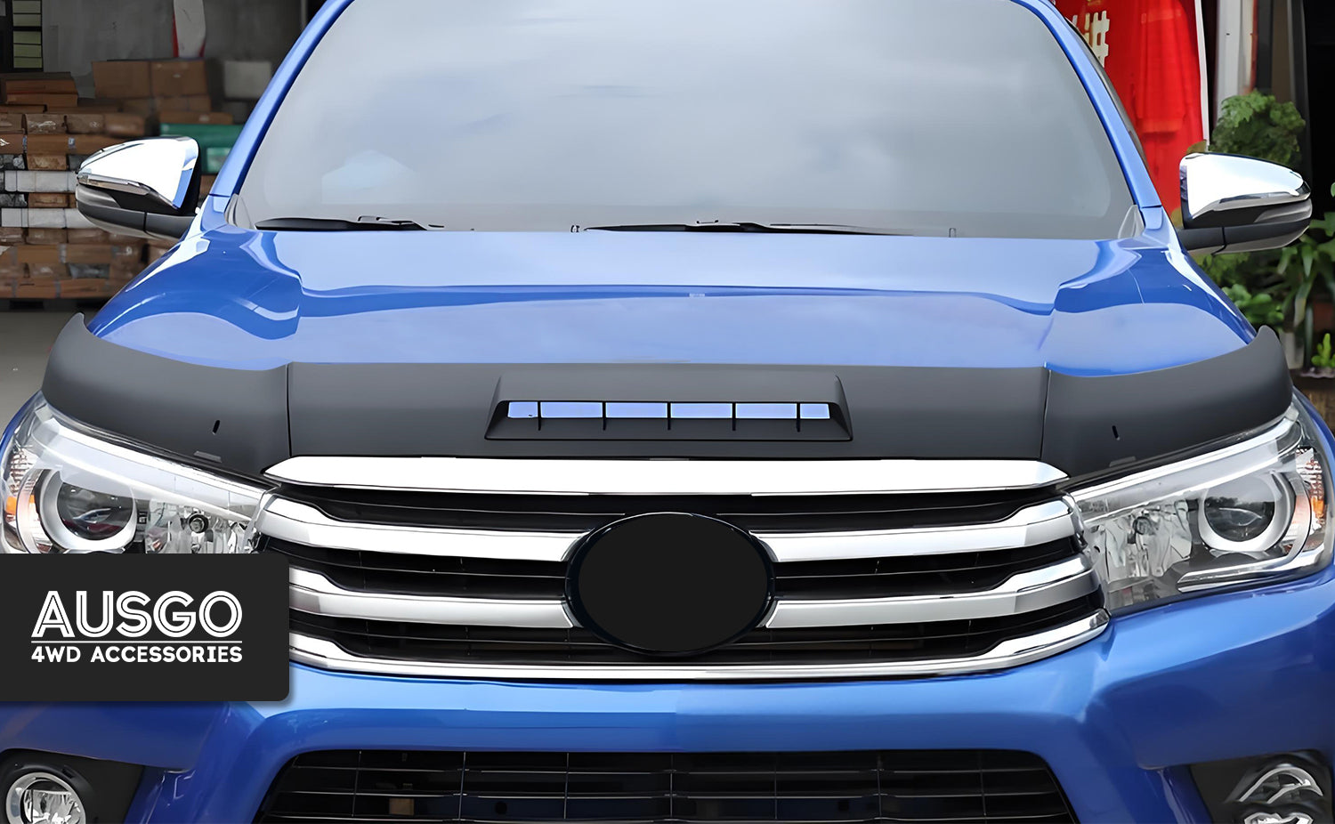 Front view of a blue Toyota HiLux.